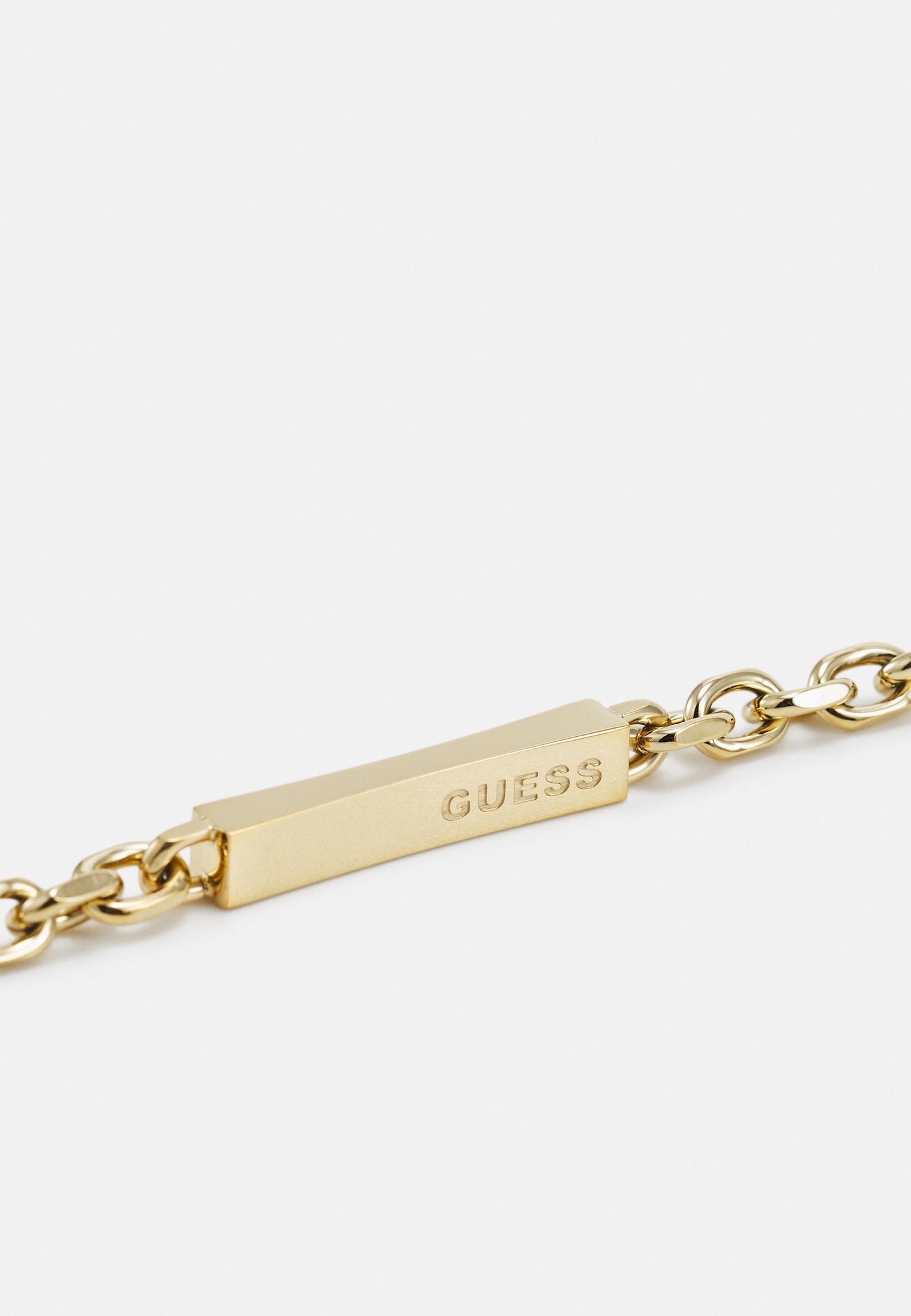 Guess Yellow Gold Tone  Plate Bracelet